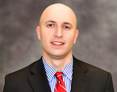 Image of Alon Nager, Esq., attorney in professional attire.